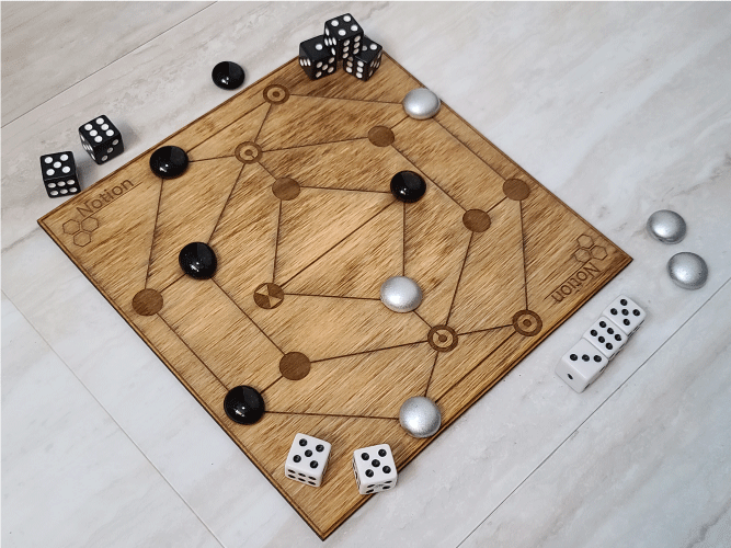 Wooden game board with engravings, pieces, and dice